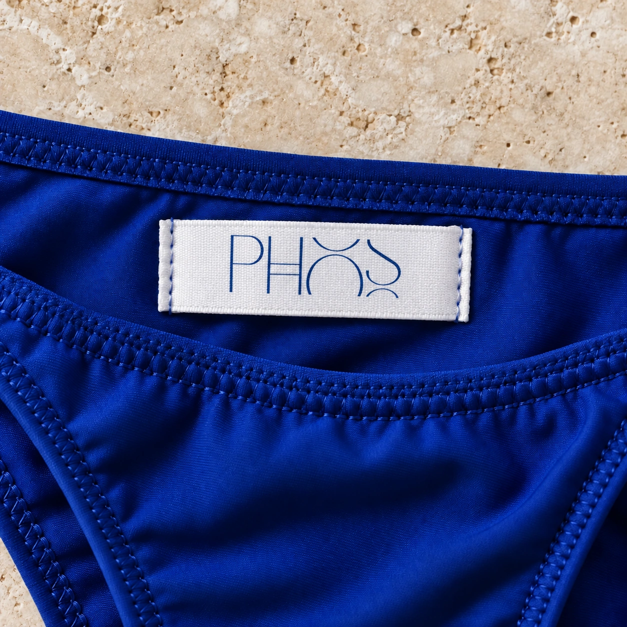 PHOS mark on a woven garment label